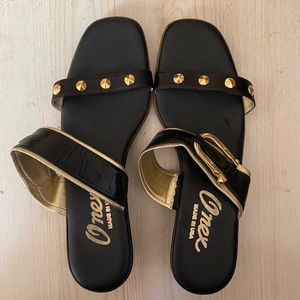 Black Onex slides. Size 8.